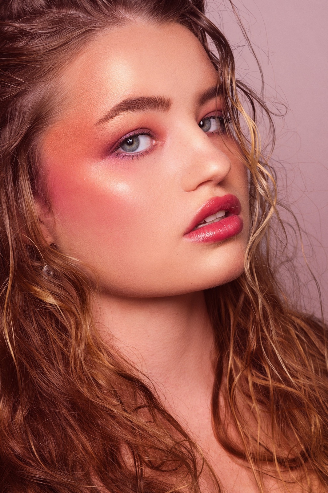 Coral glow, dewy skin